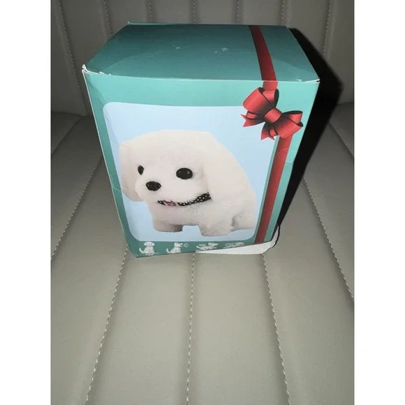White interactive Dog.  Barks, walks and wag's its tail for hours of enjoyment