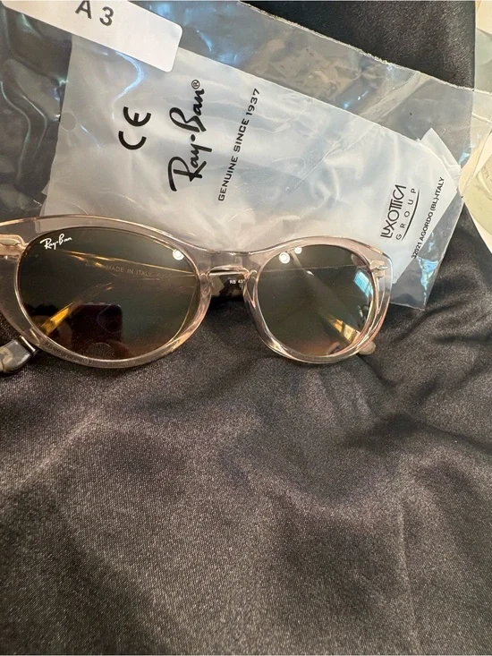 Ray-Ban Ninas Sunglasses in clear frame with green tortoise