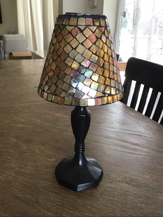 Mosaic tealight candle lamp featuring a stained glass shade.