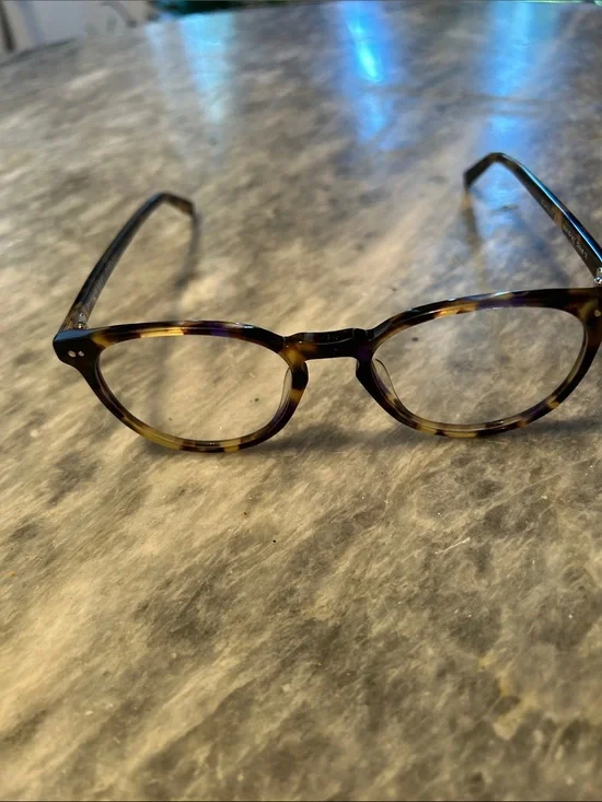 Warby Parker Tortoiseshell Round Glasses - Brown & Black Model is Blakey