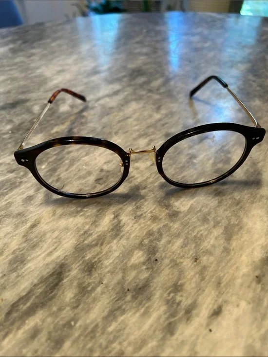 Warby Parker Gold and Tortoiseshell Eyeglass Temple Model is Jayla