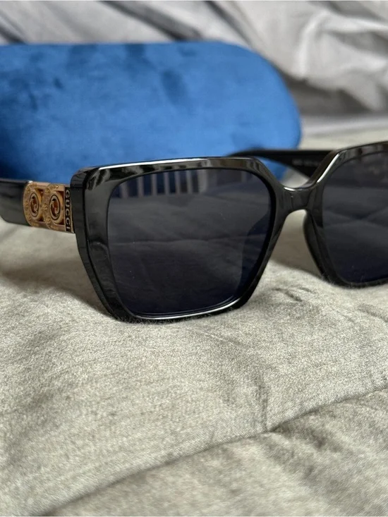 Gucci Black Sunglasses with Gold Temple Detail