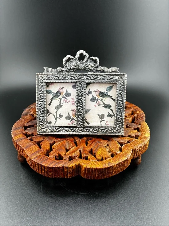 Ornate pewter Double Photo Frame with floral bow on top