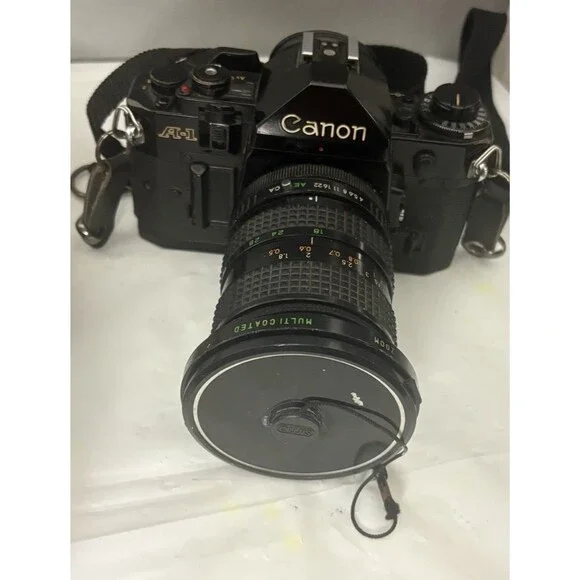 Canon A-1 35mm Film Camera with toyo optics 28mm 1:3.5 Lens and F=28-80  Tested