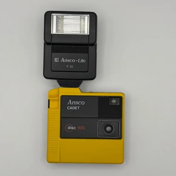 Ansco Cadet Disc‎ 100 Camera with Ansco-Lite F 20 Flash Yellow Vintage 80s Tech