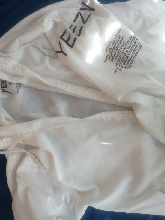 adidas Large Yeezy Yeezus Tour White Windbreaker Jacket with Black Text Branding