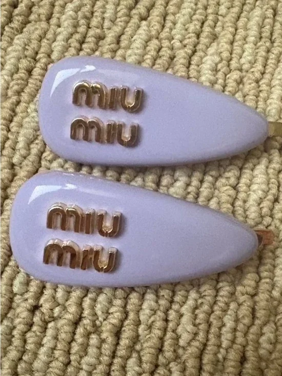 2 Miu Miu Logo Hair Clips