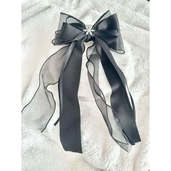 Black ribbon hair bow with snowflake charm￼