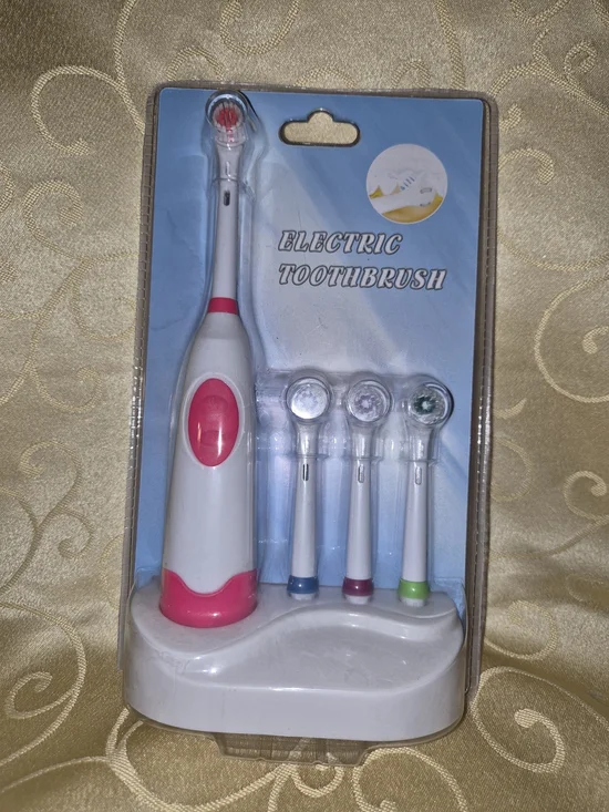 Electric Toothbrush with Pink Accents and 4 Replacement Heads