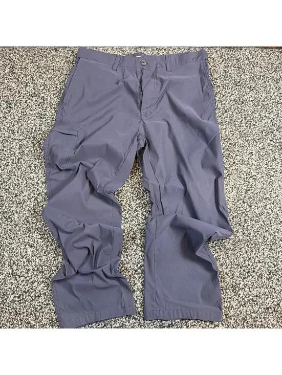 Navy blue cargo pants with adjustable waist, size 34x30