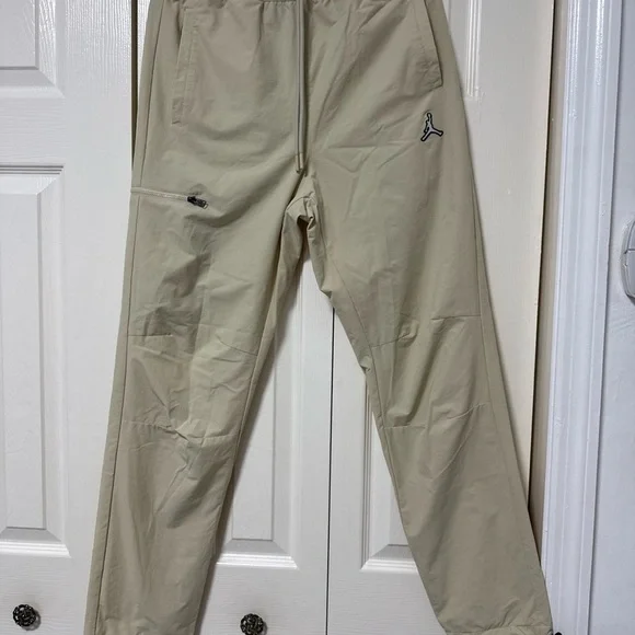 Jordan Men's Joggers in Beige with Black Jumpman A-11