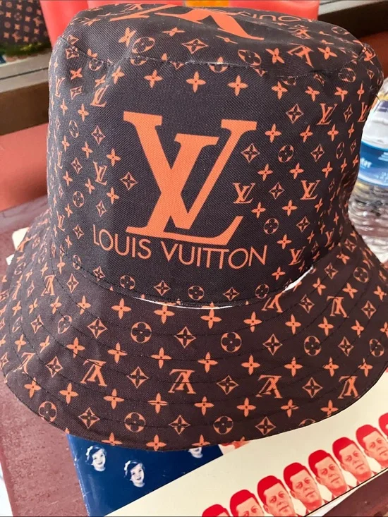 FauxLouis Vuitton Navy and Orange Monogram Bucket Hat.