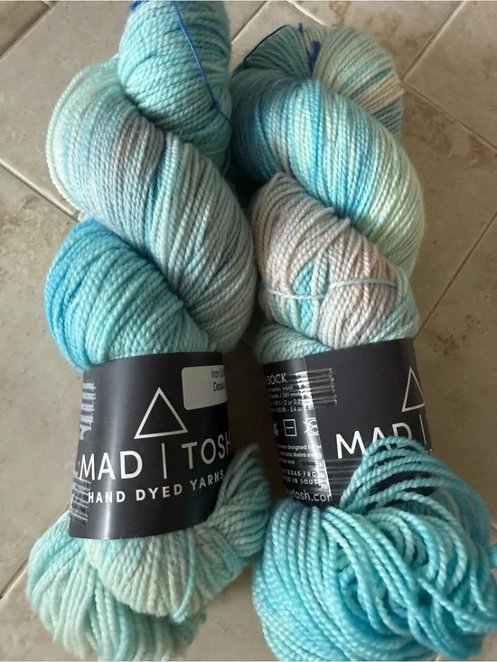 Madelinetosh Hand-Dyed Yarn Skeins in Aqua and Pale Blue