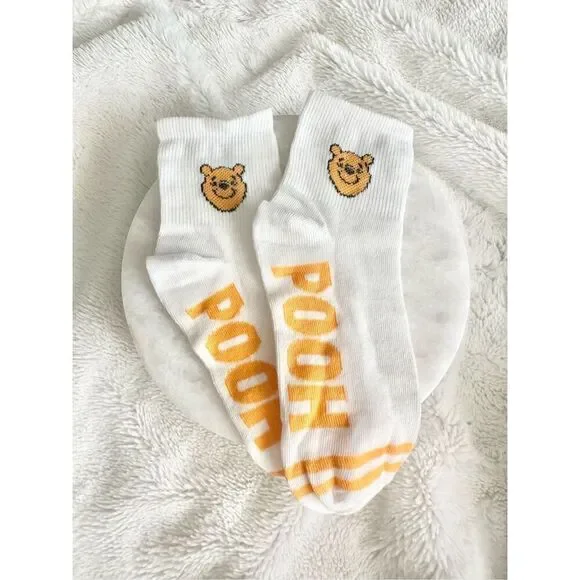 Yellow and white Pooh Bear socks