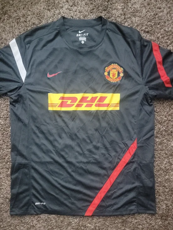 Nike 2011-2013 Manchester United training jersey, featuring a DHL