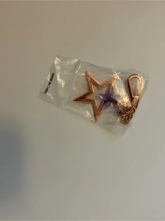NWOT MAC keychain with Purple Star Accent
