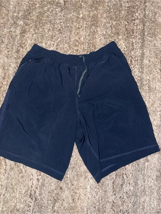Men’s Kirkland Navy Stretch Athletic Shorts or swim trunks with built in liner.