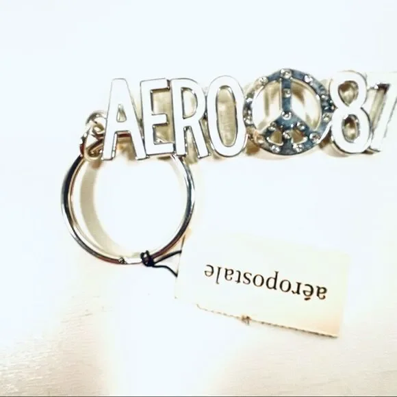 NWT Aeropostale Metallic Peace Sign White Keychain