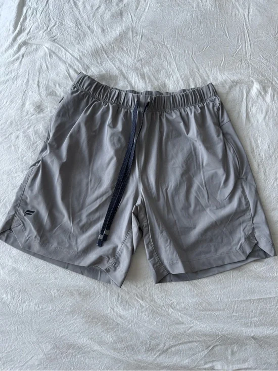 Fabletics Men's Light Gray Athletic Shorts with Navy Drawstring