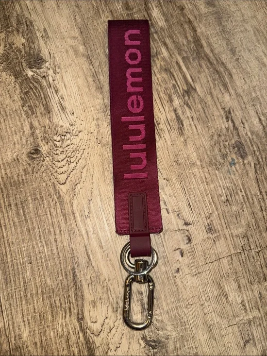 lululemon burgundy and pink Logo Wrist Key Strap