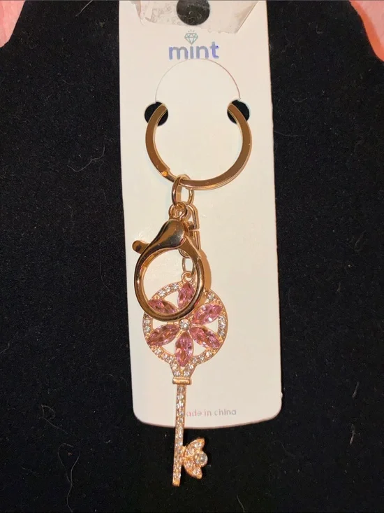 Mint Gold-Tone Key Charm with Pink Crystal Flower