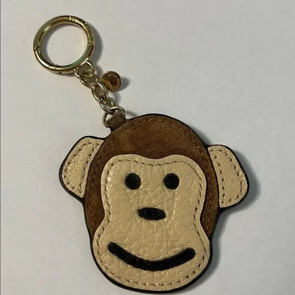 Michael Kors Leather & Suede Monkey Face Bag Charm or Keychain with gold tone
