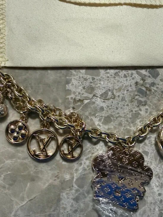 RARE and Stunning BNNU ZODIAC FASHION BAG CHARM! Comes with Dustbag and LV BOX!