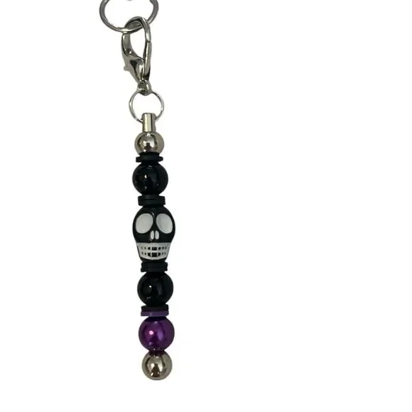 NWT one of a kind Angelas Designs black and purple skull cell phone charm