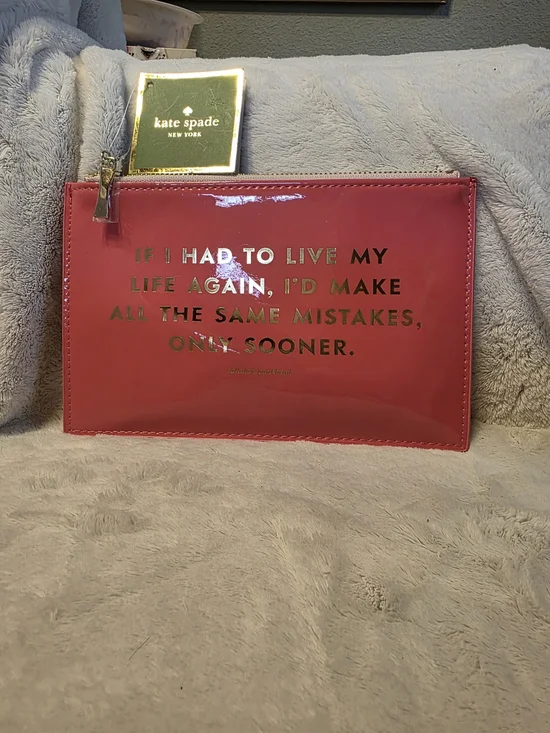 kate spade glossy hot pink zip pouch with gold logo