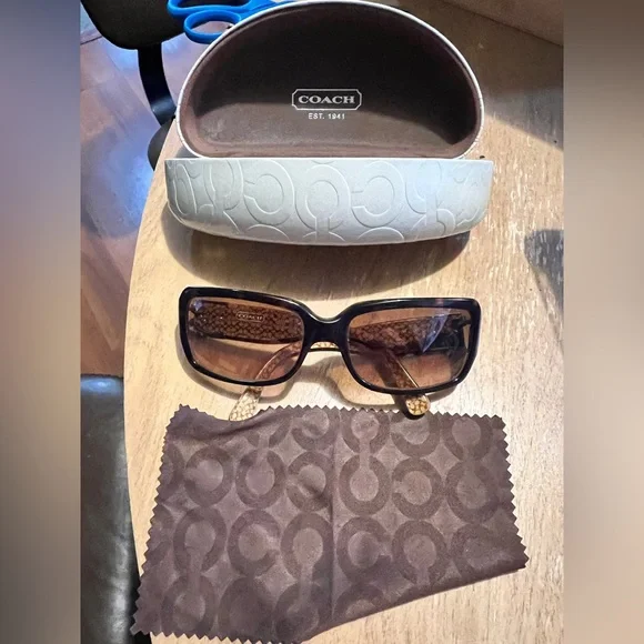 Coach sunglasses with white coach case and wipe cloth. No prescription