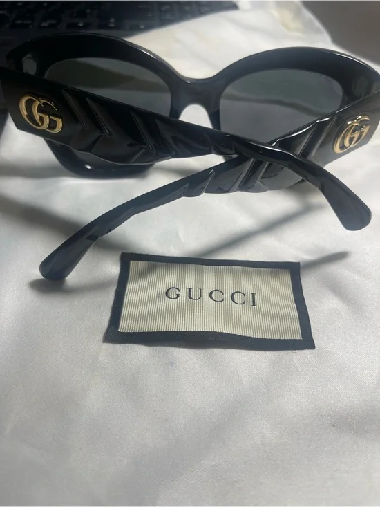 Gucci Black Round Sunglasses with Gold GG Emblem