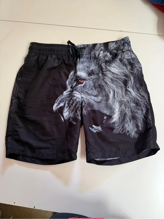 Black Men's Swim Board Shorts with Dramatic Lion Print
