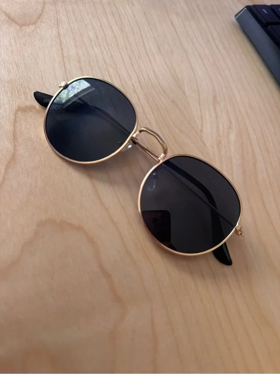Round Gold Frame Sunglasses with Black Lenses