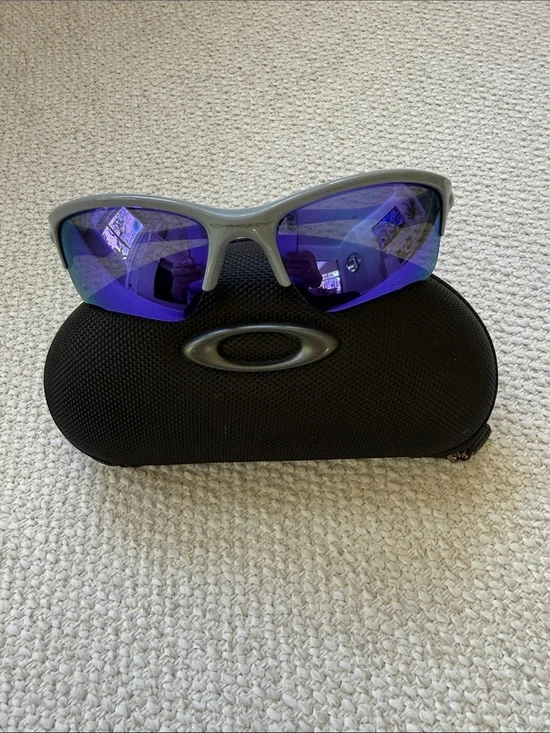 Oakley Gray Frame Sunglasses with Blue Mirrored Lenses