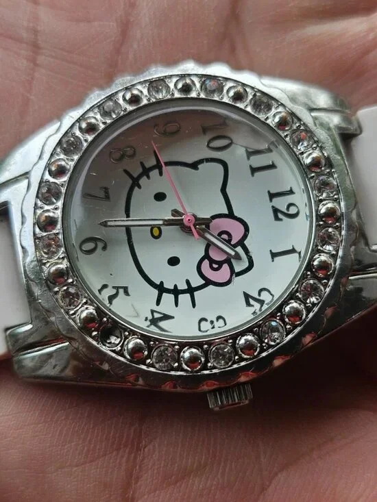 Sanrio Hello Kitty Women Watch White/Silver Tone Analog Quartz Wrist Watch
