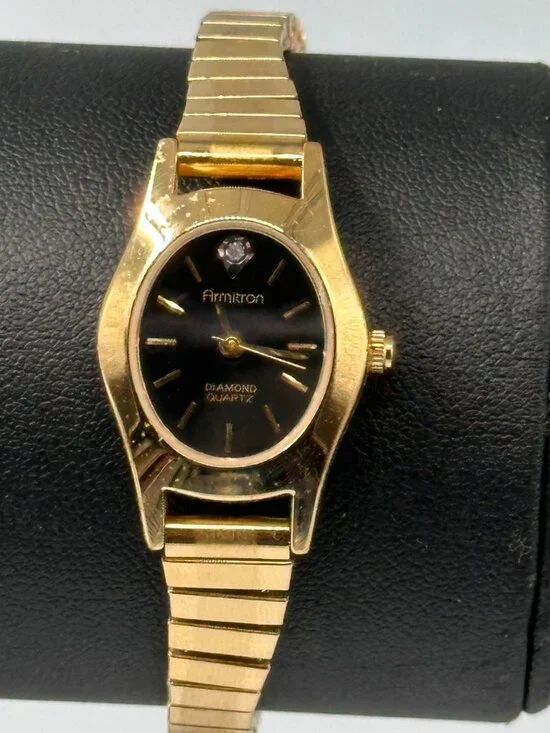 Armitron Watch Women Gold Tone Black Oval Dial Stretch Band New Battery 6