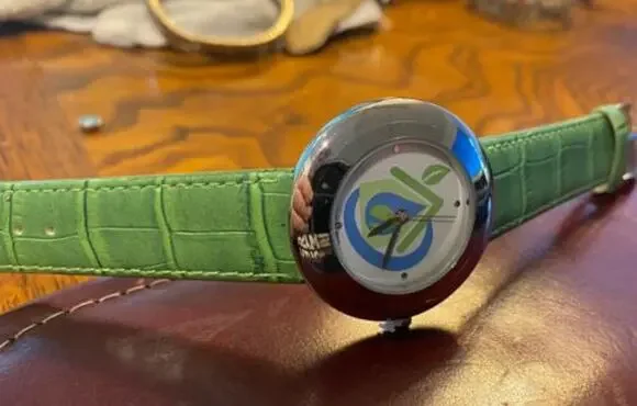 Women's 40mm Silver Tone Norwex Watch, Green Band with Company Logo Face
