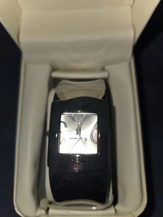 Sleek Silver Cuff Watch with Silver Dial