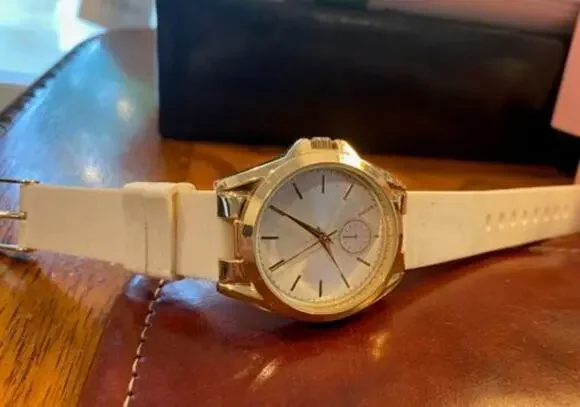 Women's 36mm Gold one Charming Charlie Watch with White Poly Band