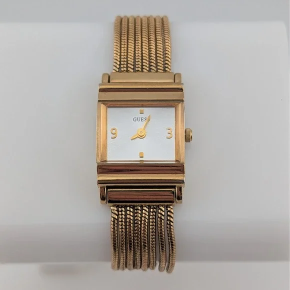 Guess Women's Gold Tone Multi Strand Bracelet Watch Silver Sunburst Dial