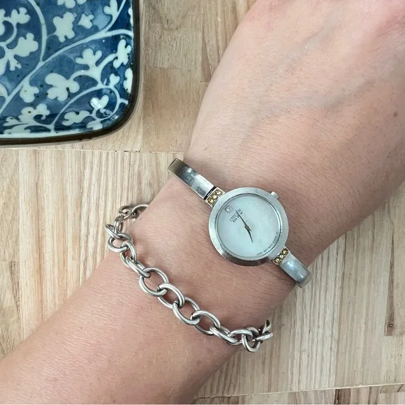 Citizen eco-drive ladies round silver tone bracelet solar power watch