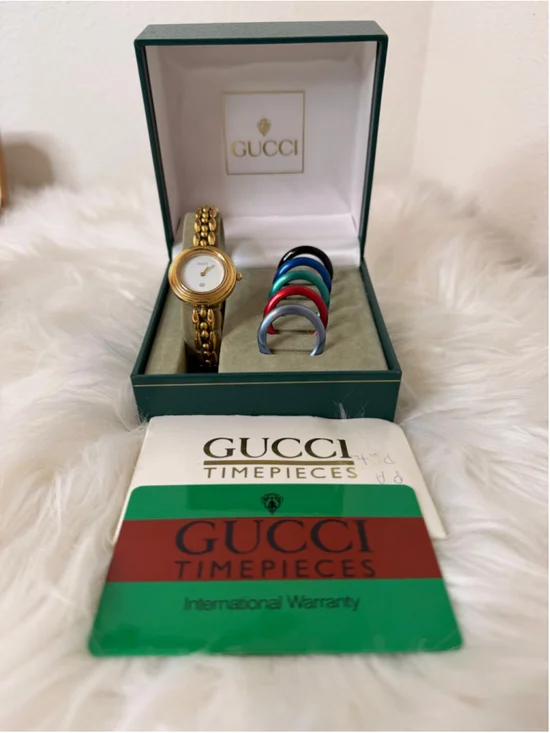 Gucci Interchangeable Bezel Rice Link Watch, w/ 6 metal bezels, box & paperwork