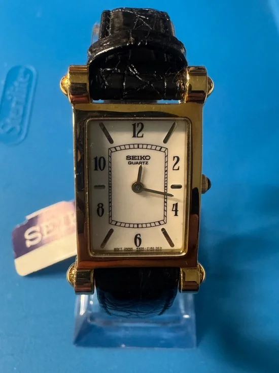 Seiko Gold-Tone Rectangular Quartz Watch with Black Strap