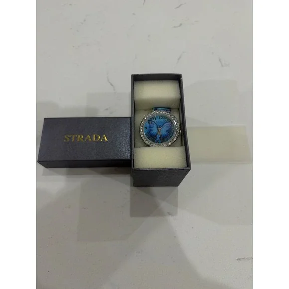 Strada Womens Blue Butterfly Dial Rhinestone Bezel Analog Watch with‎ Box