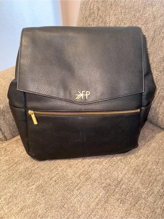 FP Black Leather Fold-Top Backpack with Gold Accents