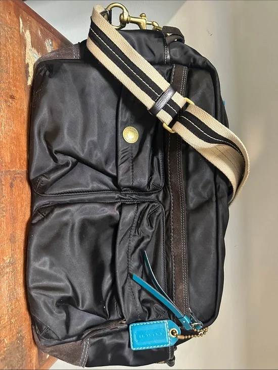 Coach Black Nylon Baby Bag with Beige-Striped Strap and Turquoise Tag