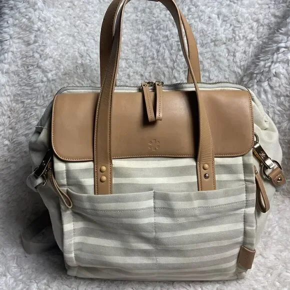 Skip Hop High line convertible Diaper Bag Beige & gray canvas tan leather straps