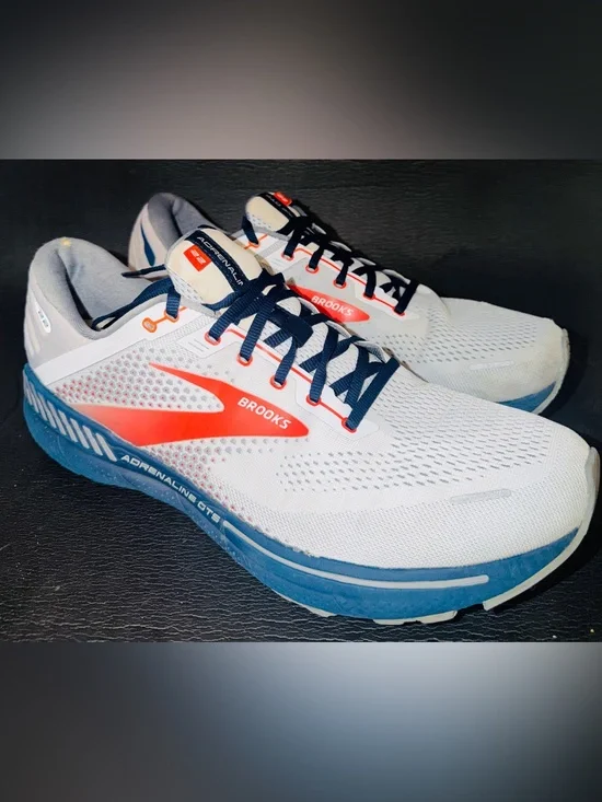 Brooks Men’s White Running Shoes with Blue Sole and Red Accent