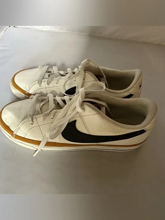 Nike White Court Legacy Sneakers with Black Swoosh and Brown Accent