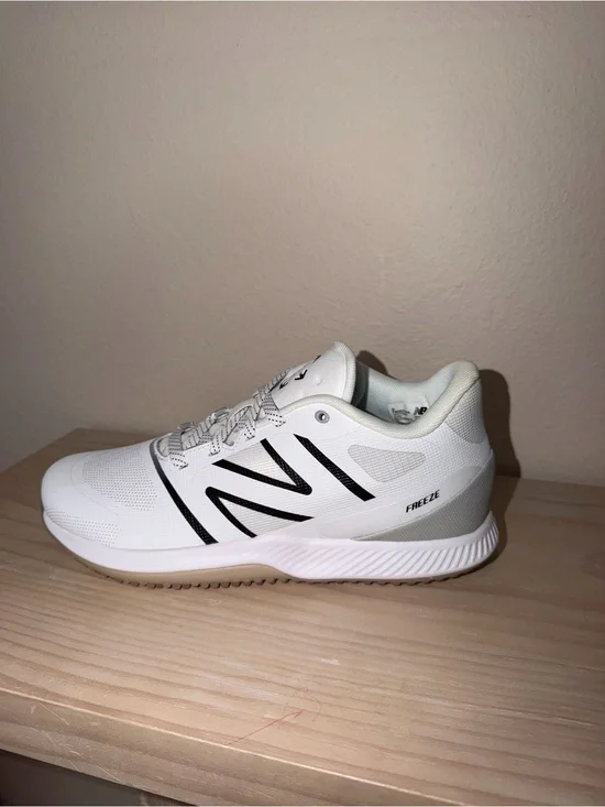New Balance Men’s White Athletic Shoes with Black Accents